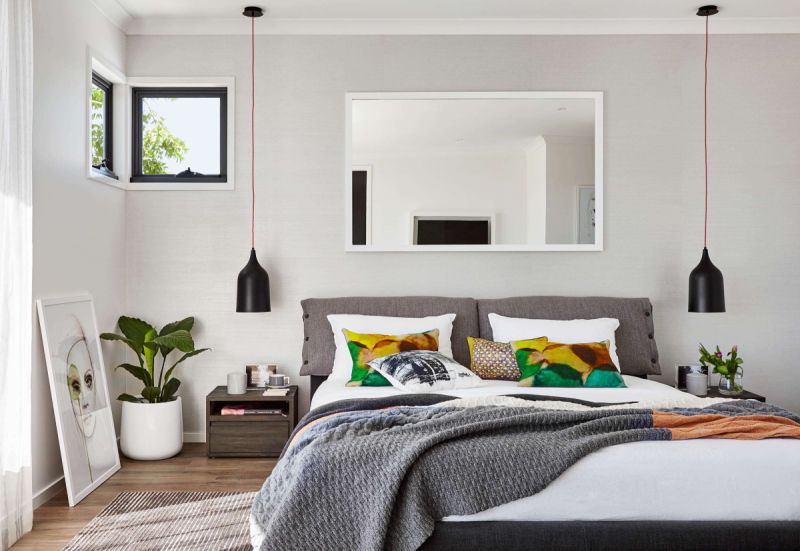 Bedroom with greenery and pendants